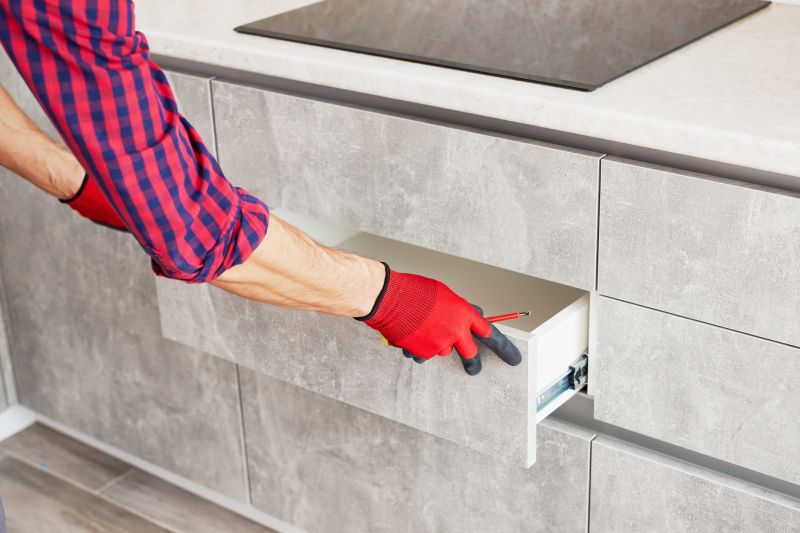 Contractor Working on Cabinets